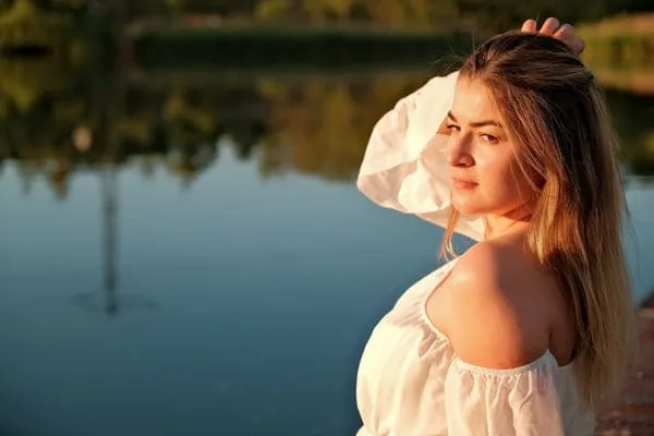 Woman by a lake — HIV Dating After a Long Break: Begin Again