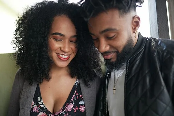 Couple smiling together — Black HIV Singles Dating With Individual Choice