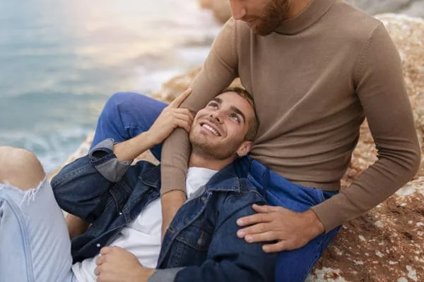 Two men relaxing together — HIV Dating Fake Profile Signs Worth Checking