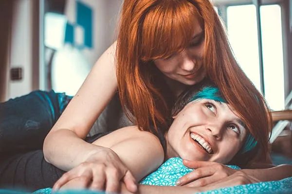 Two women relaxing together — HIV Dating and Online Harassment: Regain Control