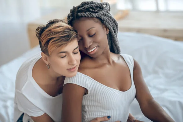 Two women sitting close — Mutual Support in HIV Dating Relationships