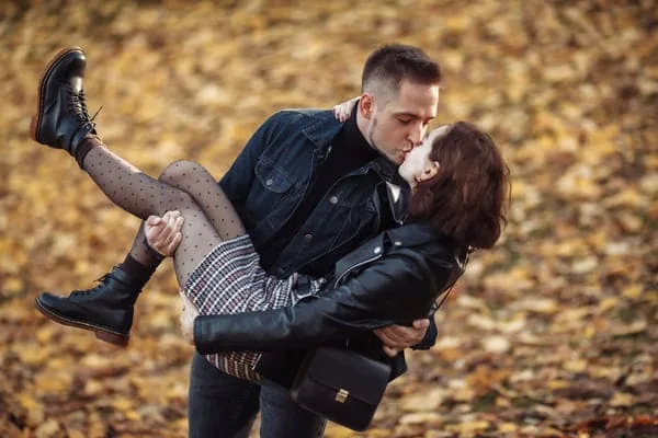 Couple enjoying a playful outdoor moment — HIV Dating Through Shared Interests and Everyday Joy